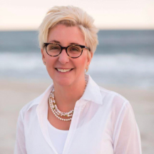 Karen A. Langone smiling at beach